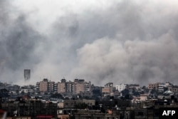 Smoke billows during an Israeli strike in Rafah in the southern Gaza Strip, Jan. 28, 2024, amid ongoing battles between Israel and the Palestinian militant group Hamas.
