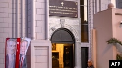 A man stands outside the new Syriac Orthodox Mor Ephrem Church on the eve of its official inauguration in Istanbul on Oct. 7, 2023. 