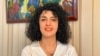 FILE — Iranian human rights activist and the vice president of the Defenders of Human Rights Center Narges Mohammadi poses in this undated handout picture. 