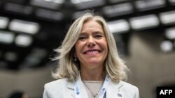 FILE - Argentina's Celeste Saulo poses after she was elected as Secretary-general of the World Meteorological Organization (WMO) in Geneva, Switzerland, June 1, 2023. Saulo called, Jan. 17, 2024, climate change “the greatest global threat of our times.”