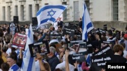 Supporters of Israel hold a solidarity rally near Downing Street, in London, Britain, Oct. 9, 2023.