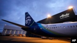 FILE - An Alaska Airlines Boeing 737 Max 9 awaits inspection at the airline's hangar at Seattle-Tacoma International Airport on Jan. 10, 2024, in SeaTac, Washington.
