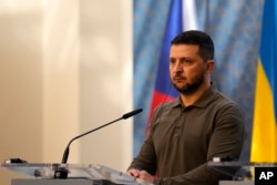 Ukrainian President Volodymyr Zelenskyy arrives for a press conference in Prague, Czech Republic, July 7, 2023.