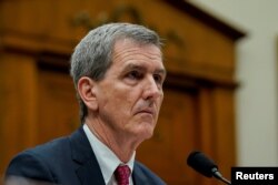 FILE - Federal Aviation Administration (FAA) Administrator Mike Whitaker testifies on Capitol Hill in Washington, Feb. 6, 2024.