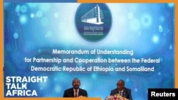 የሶማሌላንድ ፕሬዝዳንት ሙሴ ቢሂ አብዲ እና የኢትዮጵያ ጠቅላይ ሚኒስትር አብይ አህመድ 