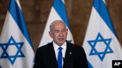 FILE - Israel's Prime Minister Benjamin Netanyahu speaks at the weekly Cabinet meeting, in the Western Wall tunnels in the Old City of Jerusalem, May 21, 2023. 