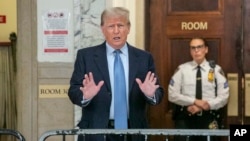 Former President Donald Trump speaks in New York City on Oct. 18, 2023, outside the New York Supreme Court room where his civil fraud trial is underway.