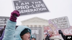 Anti-abortion activists participate in the annual March for Life in front of the Supreme Court on Jan. 19, 2024, in Washington.