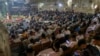 On Christmas Eve according to the Julian calendar, hundreds of Coptic Christians attend a Mass with a sermon that calls on worshippers to find peace in poverty. Cairo, Egypt, Jan. 6, 2024. (Hamada Elrasam/VOA)