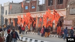 Ahead of the inauguration of the Ram Temple in Ayodhya, the town has been flooded with Hindu saffron flags, as seen in this Jan. 20, 2024, photo. (Mohammad Arfan/VOA)