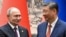 FILE - Chinese President Xi Jinping, right, and Russian President Vladimir Putin shake hands prior to their talks in Beijing, May 16, 2024.