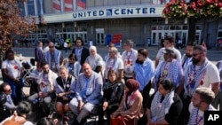 Uncommitted delegates hold a press conference outside the United Center before the Democratic National Convention, Aug. 22, 2024, in Chicago.