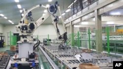 This photo provided by fire officials in Gyeongsangnam shows a vegetable packaging plant after a robot's deadly crush with a worker in Goseong, South Korea, Wednesday, Nov. 8, 2023. (South Korea Gyeongsangnam-do Fire Department via AP)
