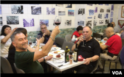 Macao's Macanese people are close knit and often gather in favorite restaurants such as Couzinha Aida, which serves Macanese food. (Cindy Sui/VOA)