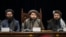 FILE - Taliban acting Defense Minister Mohammad Yaqoob Mujahid, center, speaks at a press conference in Kabul, Afghanistan, Dec. 31, 2023. 