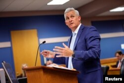 Attorney John Merchant speaks during a hearing on the Georgia election interference case, in Atlanta, Georgia, March 1, 2024.