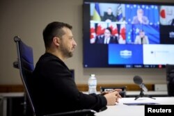 Ukraine's President Volodymyr Zelenskyy attends a video conference with G7 Leaders, in Kyiv, Ukraine, Dec. 6, 2023. (Ukrainian Presidential Press Service/Handout via Reuters)