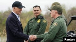U.S. President Joe Biden greets members of the U.S. Border Patrol at the U.S.-Mexico border in Brownsville, a city in the U.S. state of Texas, Feb. 29, 2024. 