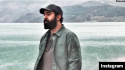 FILE - Iranian singer Mehdi Yarrahi, seen in an undated photo from his Instagram account, received his sentence of 74 lashes at the Tehran Morality Security Prosecutor's Office, his attorney said on March 5, 2025.