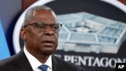 FILE - U.S. Secretary of Defense Lloyd Austin speaks at the Pentagon, near Washington, July 18, 2023.
