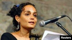 FILE - Author Arundhati Roy speaks in Istanbul, Turkey, June 24, 2005.