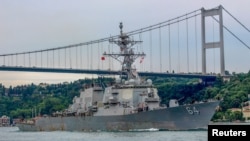 FILE — The U.S. Navy destroyer USS Carney sets sail in the Bosphorus in Istanbul, Turkey, July 14, 2019. The destroyer shot down Houthi drones in the Red Sea, Dec. 3, 2023. 