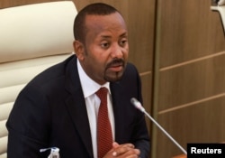 FILE - Ethiopian Prime Minister Abiy Ahmed speaks in parliament during a session to approve the country's 2024-25 budget, in Addis Ababa, July 4, 2024.
