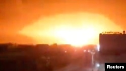 FILE — An explosion follows an attack amid the U.S.-led strikes on Houthi targets in Yemen, in this screenshot from a video released Jan. 18, 2024, and obtained by Reuters. U.S. Central Command forces hit a Houthi anti-ship missile prepared aimed at the Gulf of Aden on Saturday. 