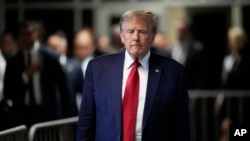 Former US President Donald Trump leaves Manhattan criminal court, Feb. 15, 2024, in New York. 