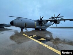 A French Air Force Airbus A400M army plane is seen before take-off to deviver humanitarian aid for Gaza, at Orleans Air Base, France, Nov. 4, 2023.