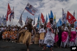 Supporters wait for the arrival of Democratic Republic of the Congo President Felix Tshisekedi at a rally in Goma, Eastern Congo, Sunday, Dec. 10, 2023. Tshisekedi is seeking reelection in the Dec. 20 elections.