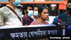 Journalist Saydia Gulrukh Kamal speaks at a protest in May 2021. The journalist says she is harassed and attacked over her reporting. (Credit: Shahidul Islam Sabuj)