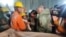 One of the trapped workers is checked out after he was rescued from a collapsed tunnel site in Uttarkashi in the northern state of Uttarakhand, India, Nov. 28, 2023. (Uttarkashi District Information Officer/handout via Reuters)