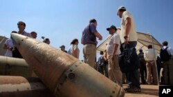 FILE - Cluster bomb units are displayed at a Lebanese military base in Nabatiyeh, Sept. 12, 2011. The Biden administration said July 7, 2023, that it would provide cluster munitions to Ukraine in the latest military aid package for the war against Russia.