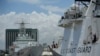 The U.S. Coast Guard Cutter Stratton, right, and Japanese Coast Guard Akitsushima dock as they arrive at the pier in Manila, Philippines on June 1, 2023. (Aaron Favila/AP)