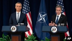Secretary of State Antony Blinken and NATO Secretary General Jens Stoltenberg speak during a news conference at the State Department, Jan. 29, 2024, in Washington. 