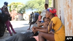 Families take to the streets to escape the gangs in Solino, a neighborhood of Port-au-Prince, Haiti, Jan. 18, 2024.