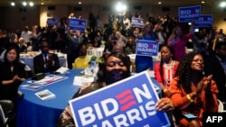 Attendees cheer as U.S. President Joe Biden speaks during the South Carolina's First in the Nation Dinner at the South Carolina State Fairgrounds in Columbia, South Carolina, Jan. 27, 2024.