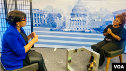 Burkinabe journalist Mariam Ouedraogo, right, is seen during an interview with Salem Solomon at VOA headquarters in Washington.