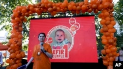 FILE - Sandra Miasnik, an aunt of Argentine-Israeli infant Kfir Bibas, a hostage of Hamas in Gaza, attends a gathering one day before his first birthday in Buenos Aires, Argentina, Jan. 17, 2024.