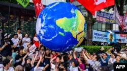 Activists gather in Seoul, Korea, on June 24, 2023, to protest a planned release of water from the Fukushima nuclear plant in Japan. 