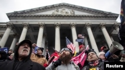 Pro-Trump protesters rally to contest the certification of the 2020 U.S. presidential election results by Congress at the Capitol in Washington on Jan. 6, 2021.