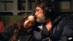 Gal Tarshansky, who was released Nov. 29, sits with her father in an IDF helicopter en route from Hatzerim Air Base to Schneider Hospital, in Israel, Nov. 30, 2023.