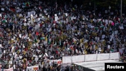Demonstrators rally in support of Palestinians amid the ongoing conflict between Israel and Hamas, at Freedom Plaza in Washington, Nov. 4, 2023.