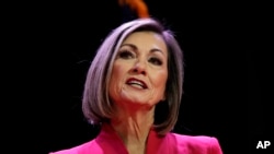FILE - Republican Iowa Gov. Kim Reynolds delivers her inaugural address, Jan. 13, 2023, in Des Moines, Iowa.