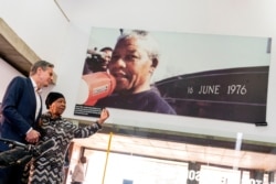 U.S. Secretary of State Antony Blinken and Antoinette Sithole, the sister of the late Hector Pieterson, tour the Hector Pieterson Memorial in Soweto, South Africa,on August 7, 2022. (Andrew Harnik/Reuters)