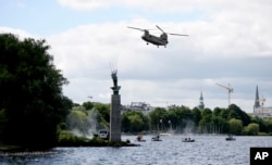 A helicopter from the US Army lands during a drill including the US Army and German federal police ahead of the upcoming G-20 Summit near the Alster river in Hamburg, Germany, July 4, 2017.