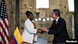Colombia's Vice President Francia Marquez shakes hands with U.S. Secretary of State Antony Blinken during their visit to Fragmentos Museum in Bogota, Colombia, Oct. 3, 2022.