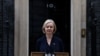 British Prime Minister Liz Truss announces her resignation, outside Number 10 Downing Street, London, Oct. 20, 2022.