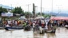 FILE: Thousands of travelers are stranded in Nigeria's Kogi state after roads to other parts of the West African nation became submerged in floods, Oct. 6, 2022. More than 600 have died and more than 1 million have been displaced due to Nigeria's worst flooding in a decade. 